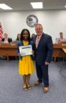Mylah Wright was recognized for her musical performance of the National Anthem at the 2022 Shooting for the Stars Employee Recognition Banquet.